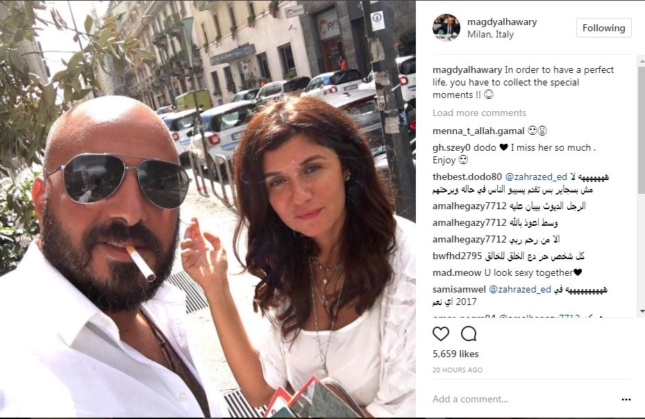 بعد مايوه نيللى كريم.. غادة عادل بـ"السيجارة" مع زوجها في ميلانو