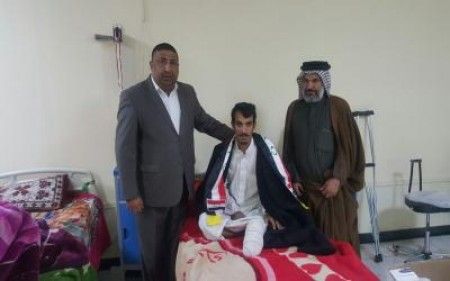 لجنة متابعة شؤوو الشهداء والجرحى في الفرقة التاسعة تزور احد الجرحى الابطال