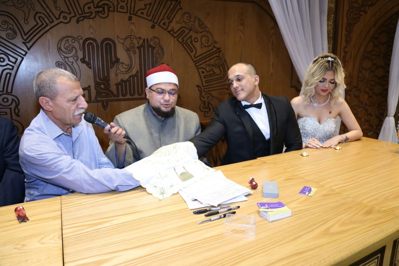صور.. عقد قرآن صلاح جمال ونورهان خلف فى مسجد الشرطة
