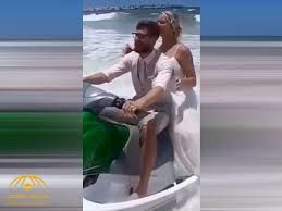 شاهد... حاولو التقاط صورة تذكارة رائعة ولكنهم وقعو في الفخ وسقطت العروس (فيديو)