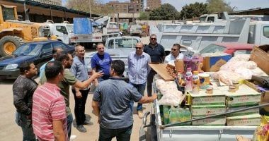 ضبط 8 أطنان مواد غذائية منتهية الصلاحية خلال حملة فى إمبابة.. صور