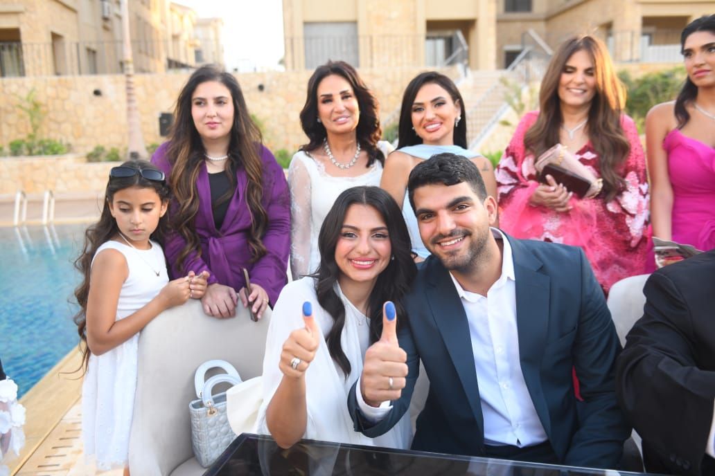 أمل رزق تحتفل بعقد قران ابنتها هيا إسماعيل كتكت وآدم مصطفى العربى.. صور